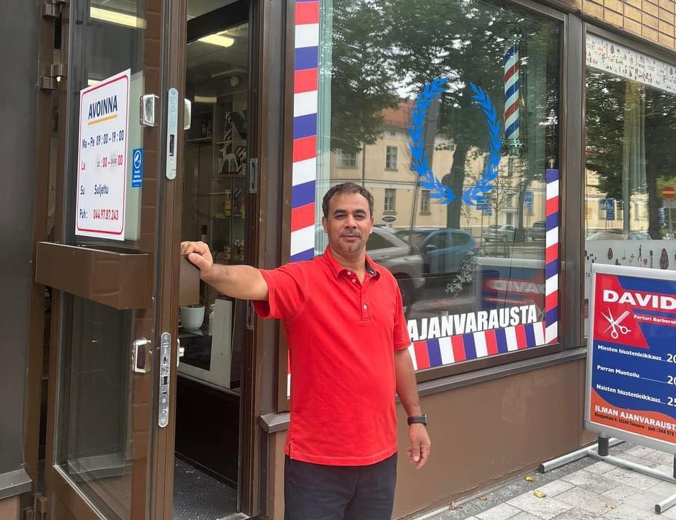 David welcoming you at David Parturi Barber Shop